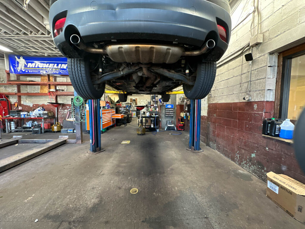 Grey Car raised for Service at Ronnie's Automotive in Billerica, MA.